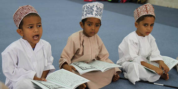 children at the coran school